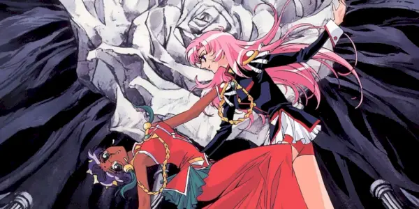 Imagen de la Chica Revolucionaria Utena que muestra a Utena sosteniendo a Anthe con una rosa de piedra detrás de ellas.
