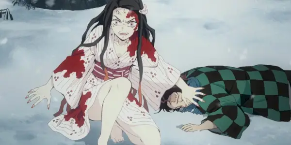 Demon Slayer Kimetsu no Yaiba - Nezuko protege Tanjirou