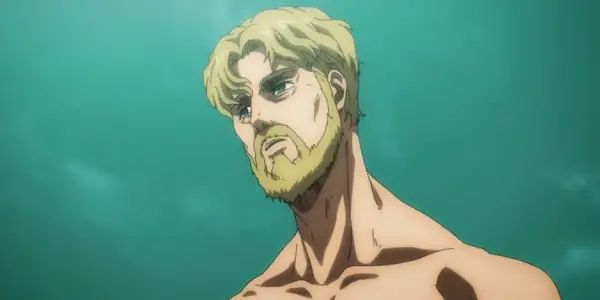 Zeke Yeager schaut in „Attack on Titan“ verzweifelt zu, mit einem grünen Feld hinter sich.