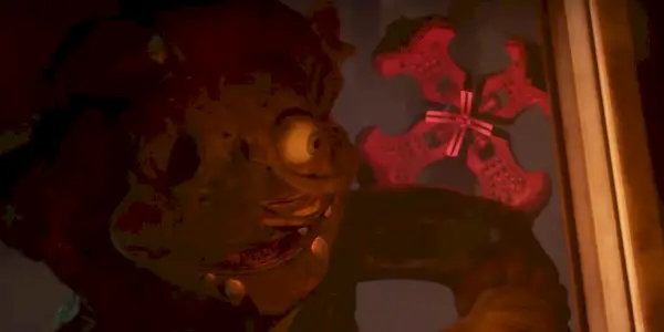 Mimikeren på den anden side af et vindue, da scooperen nærmer sig det i en afslutning på FNAF Security Breach Ruin