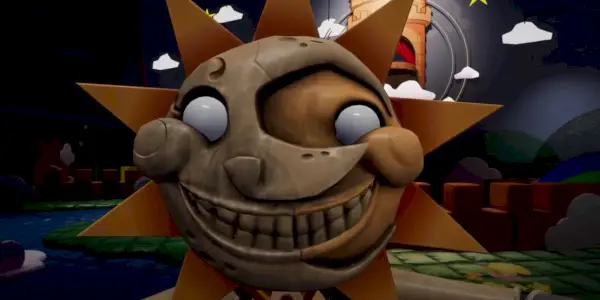 The Daycare Attendant od FNAF, animatronic, ktorý vyzerá ako stelesnenie slnka a mesiaca súčasne.