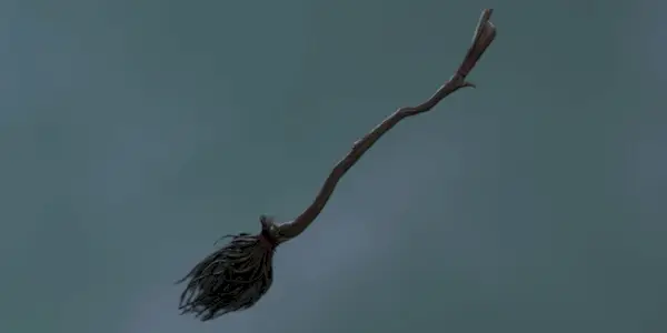En gengivelse af familiens antikke kost i Hogwarts-arven mod en grå baggrund.