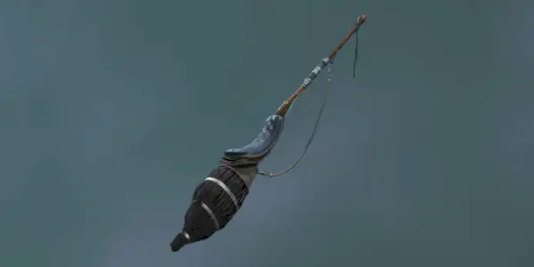 En gengivelse af Night Dancer Broom i Hogwarts Legacy mod en grå baggrund.
