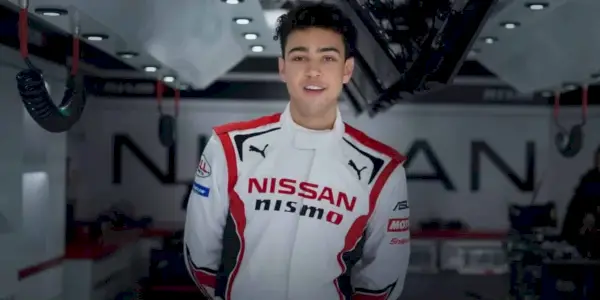 Jann con traje de carreras en Gran Turismo