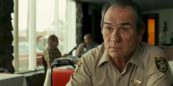 Zvonek s vykulenýma očima v No Country For Old Men