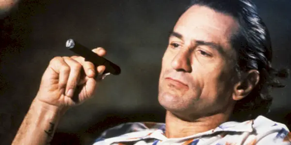 Robert De Niro som Max Cady med en cigar i Cape Fear
