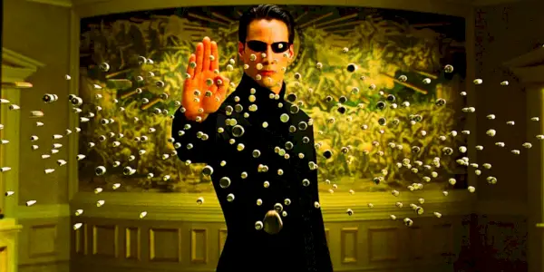Neo mit erhobener Hand in The Matrix