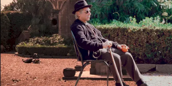 Michael Corleone zomiera sediac na stoličke na konci Krstného otca III
