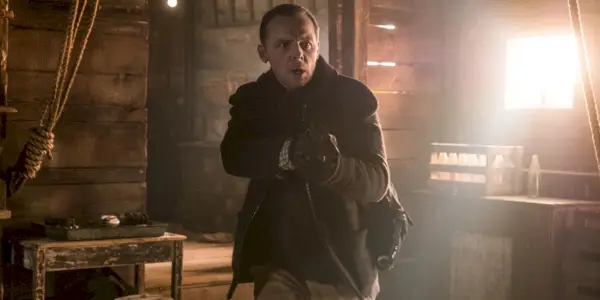 Simon Pegg med en pistol i Mission: Impossible Fallout