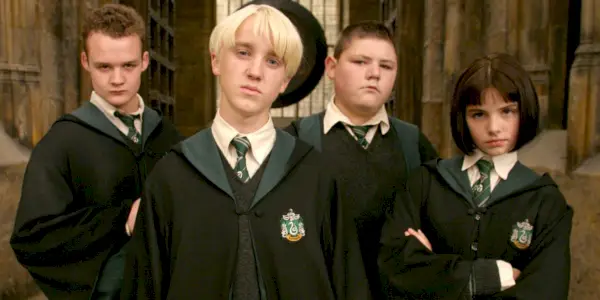 Draco Malfoy, Vincent Crabbe, Greggory Goyle a Pansy Parkinson zo série Harry Potter.
