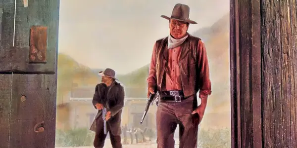 John Wayne si avvicina a un portone a Rio Lobo