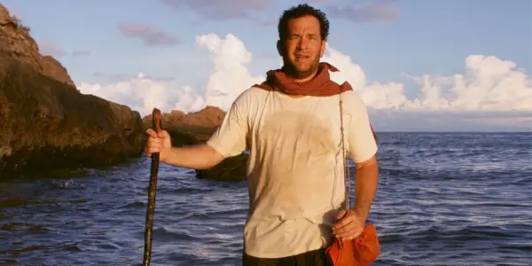 Tom Hanks com uma bengala em Cast Away