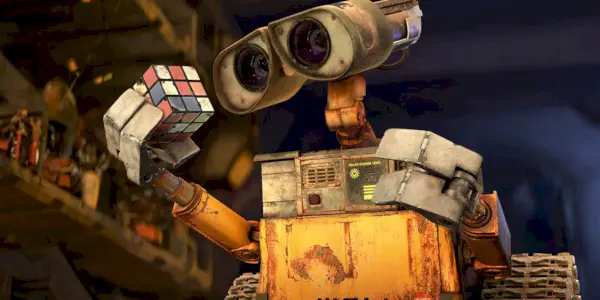 Obrázek WALL-E držícího rubikovou kostku ve filmu