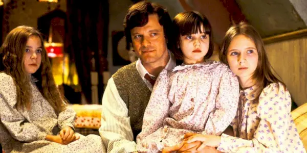 Uma família sentada em Nanny McPhee