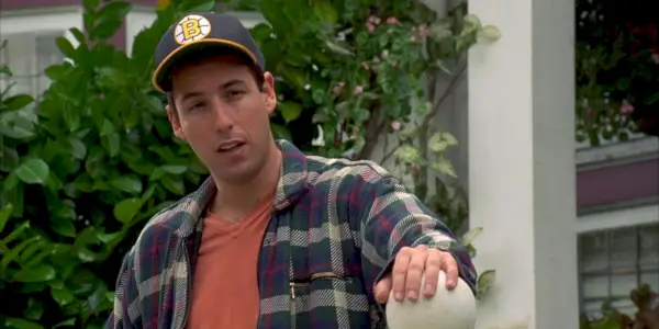 Adam Sandler opřený o příspěvek v Happy Gilmore