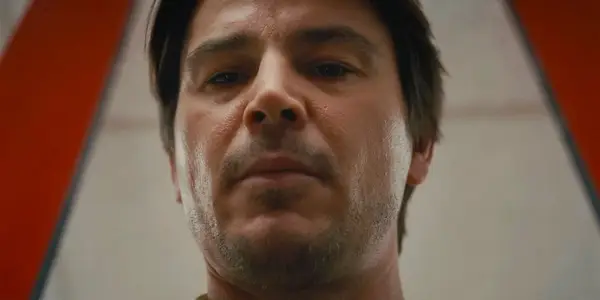 Josh Hartnett as the Butcher, looking downward toward