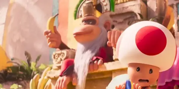 Cranky Kong olha de seu trono no filme Super Mario Bros.