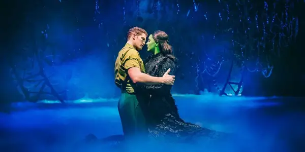Fiyero and Elphaba holding each other in Wicked