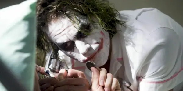 Cesar Romero als The Joker mit breitem Lächeln im Jahr 1966