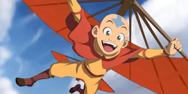 Aang d'Avatar le dernier maître de l'air planant dans le ciel