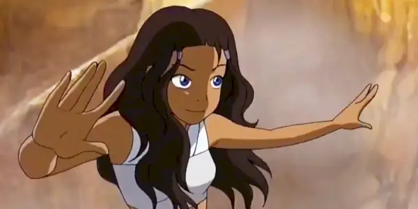 Katara agite ses mains en l'air se préparant à maîtriser l'eau dans Avatar : le dernier maître de l'air.