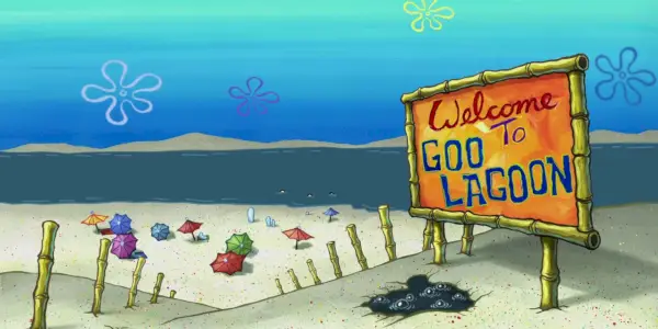 Un cartello di Goo Lagoon in una spiaggia