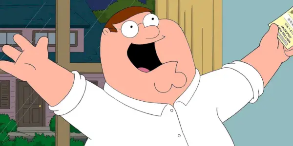 פיטר נראה סופר מאושר בעודו מחזיק עיתון ב-Family Guy