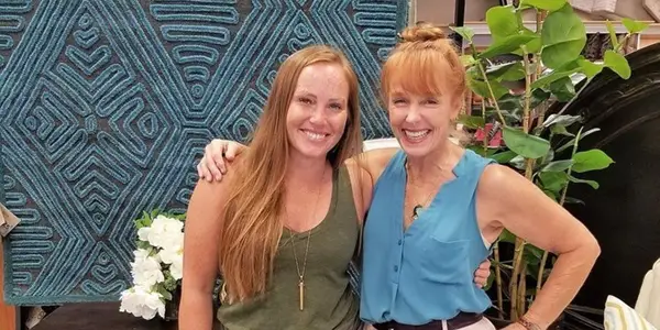 Mina Starsiak & Karen E. Laine with their arms around each other in Good Bones