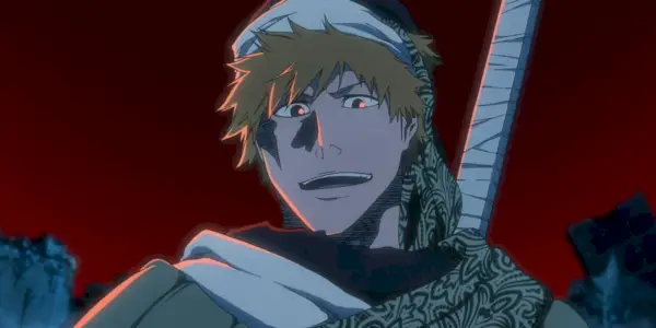 Bleach TYBW: Ichigo arriva per combattere contro un back drop rosso con una bandana in testa.
