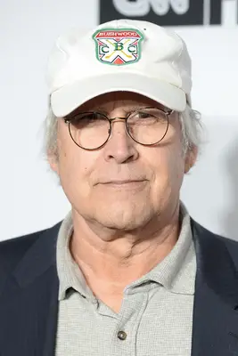 Headshot Of Chevy Chase In The Premiere of Love, Gilda
