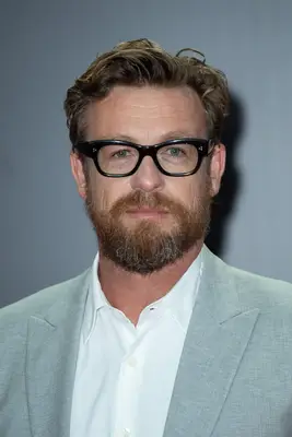 Headshot Of Simon Baker
