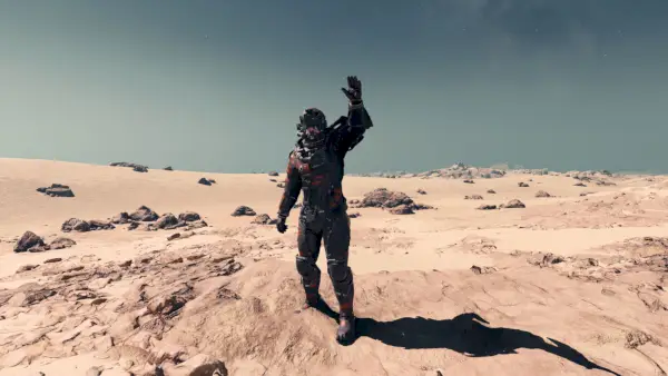 Starfield Player In UC Antixeno Armor Armor Set Waving On Desert Planet