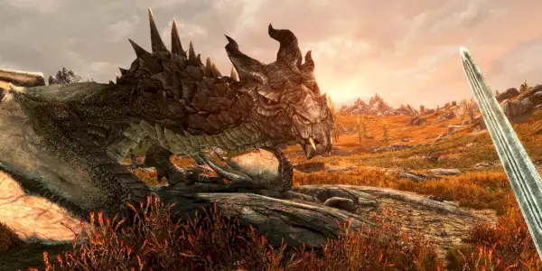 Una visuale in prima persona di qualcuno che impugna una spada e guarda un drago in Skyrim VR