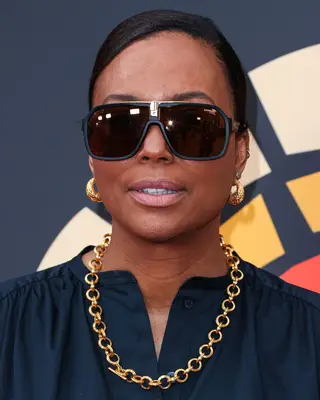 Headshot Of Aisha Tyler In The Charlize Theron Africa Outreach Project (CTAOP) 2023