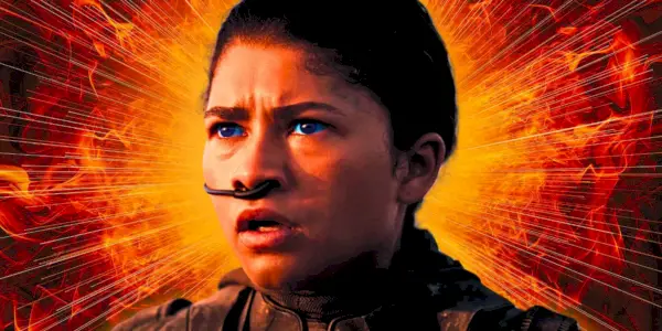 Chani (Zendaya) avec un air horrifié sur son visage sur un fond rouge et orange ardent dans Dune : Deuxième partie