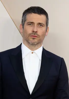 Headshot Of Robert James-Collier