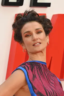 Headshot Of Indira Varma In The UK premiere of