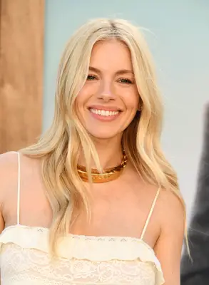 Headshot Of Sienna Miller In The Los Angeles premiere of