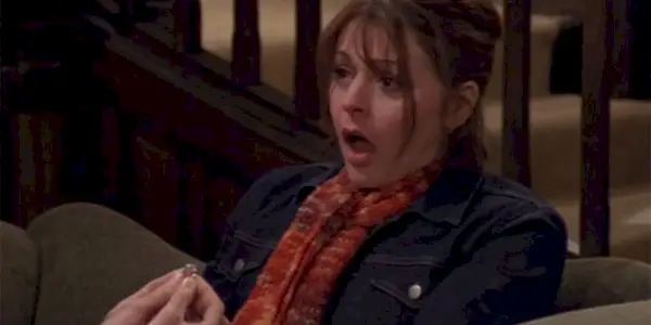 Daphne ser overrasket ud, mens Niles frier i Frasier